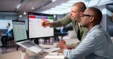 Auditor Examines Digital Transaction Logs To Verify System Security And Compl Stock Photos