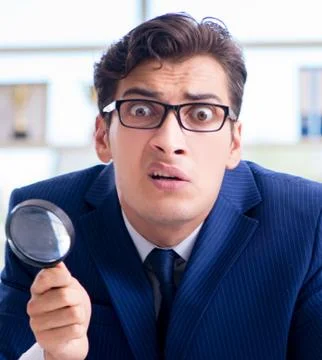Auditor looking for errors in the financial statements 스톡 사진