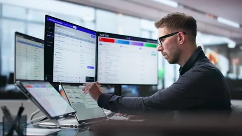 Auditor Reviews Software Dashboard To Track Compliance Stock Footage 339887394
