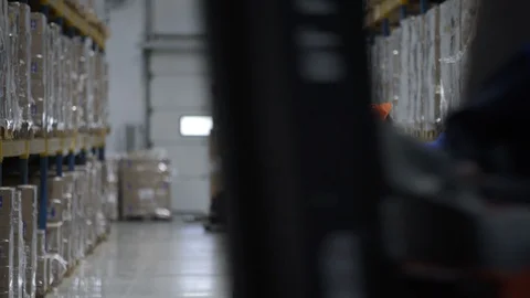 Auditors Wearing Hard Hat Counts Merchandise in Warehouse. Warehouse workers Stock Footage 106194366
