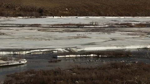 Aufeis Overflow Ice on River along Dempster Highway Stock Footage 79281011