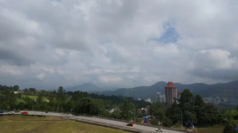 AUG 10.2026.MALAYSIA.A mountain road with sparse traffic Video stock 341851424