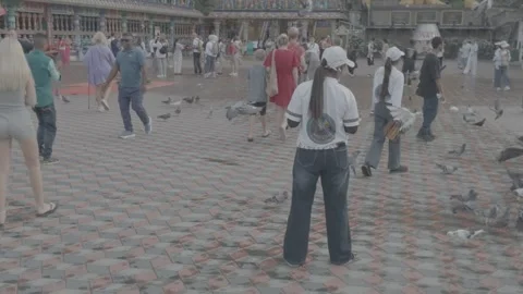 AUG 31.2026.Tourists are strolling through the paved temple courtyard. Stock Footage 344093949