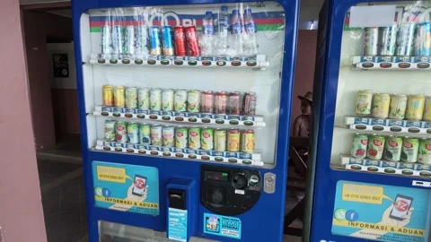 AUG 3.2026.MALAYSIA.Two blue automatic beverage vending machines Vidéo 341476963