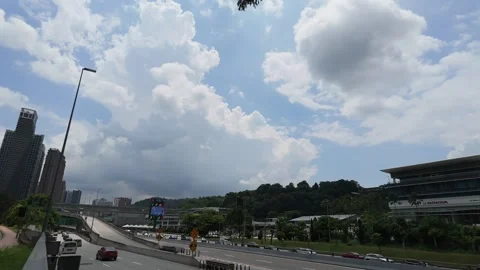 AUG 5.2026.MALAYSIA.City roads; large clouds in the sky above the hills. Stock Footage 341776672