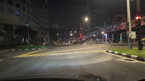 AUG 5.2026.MALAYSIA.Night view of an empty city street intersection. Stock Footage 341786373