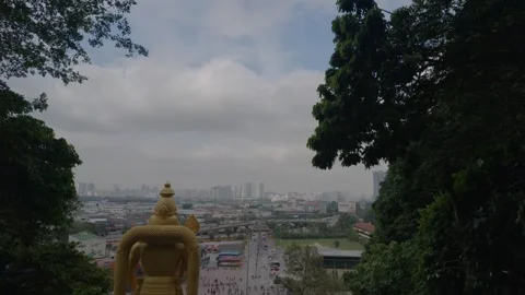 AUG 6.2026.MALAYSIA.Looking down from above at the back of the golden statue. Video stock 341833323