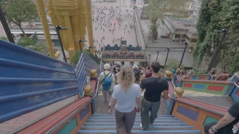 AUG 6.2026.MALAYSIA.Looking down from a height at the backs of the tourists. Video stock 341833321