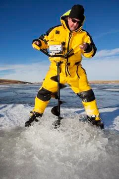 Augering a hole Stock Photos