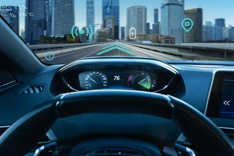 Augmented reality car navigation concept. Driver's view of the city and stree Stock Photos