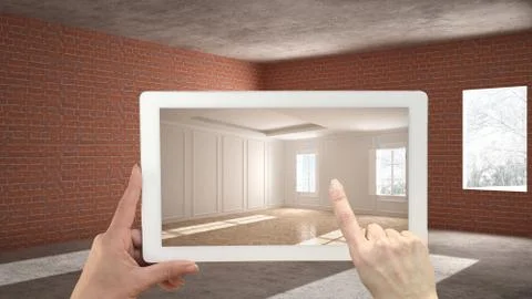 Augmented reality concept. Hand holding tablet with AR application used to si Illustrazione stock