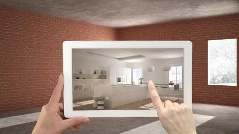 Augmented reality concept. Hand holding tablet with AR application used to si Illustrazione stock