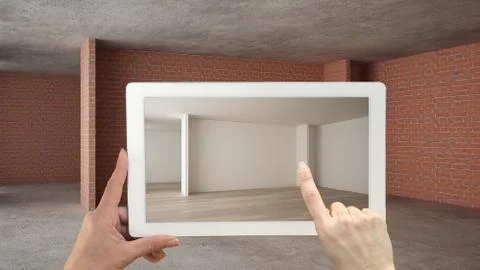 Augmented reality concept. Hand holding tablet with AR application used to si Illustrazione stock