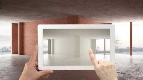 Augmented reality concept. Hand holding tablet with AR application used to si Illustrazione stock