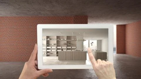 Augmented reality concept. Hand holding tablet with AR application used to si Illustrazione stock