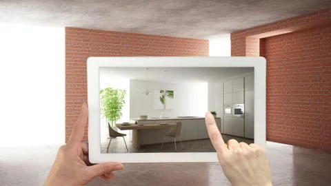 Augmented reality concept. Hand holding tablet with AR application used to si Illustrazione stock
