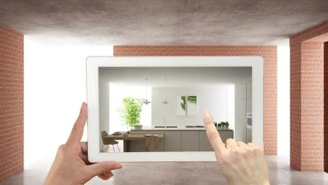 Augmented reality concept. Hand holding tablet with AR application used to si Illustrazione stock