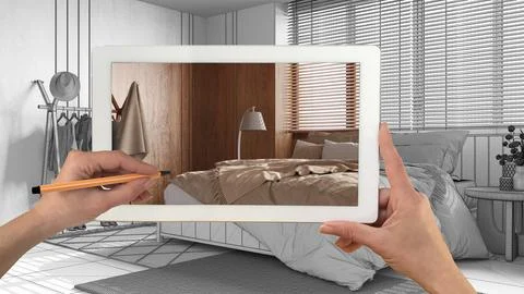 Augmented reality concept. Hand holding tablet with AR application used to .. Stock Illustration