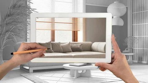 Augmented reality concept. Hand holding tablet with AR application used to .. Stock Illustration
