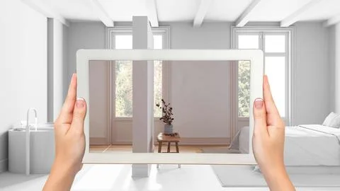 Augmented reality concept. Hand holding tablet with AR application used to .. Stock Illustration