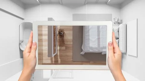 Augmented reality concept. Hand holding tablet with AR application used to .. Stock Illustration