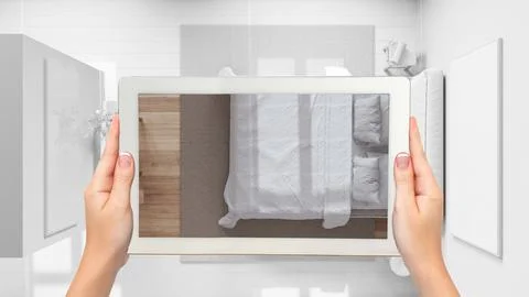 Augmented reality concept. Hand holding tablet with AR application used to .. Stock Illustration
