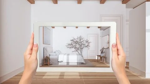 Augmented reality concept. Hand holding tablet with AR application used to .. Stock Illustration