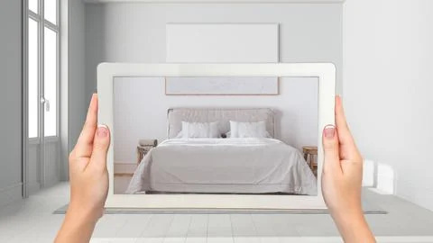 Augmented reality concept. Hand holding tablet with AR application used to .. Stock Illustration