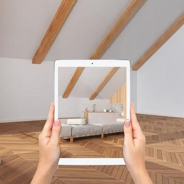 Augmented reality concept. Hand holding tablet with AR application used to .. Foto stock