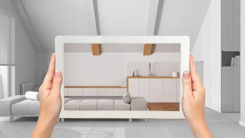 Augmented reality concept. Hand holding tablet with AR application used to .. Stock Photos