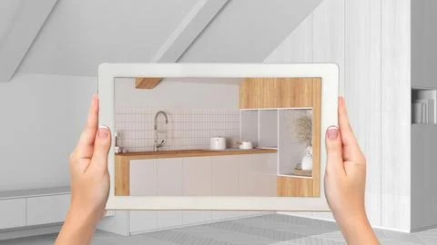 Augmented reality concept. Hand holding tablet with AR application used to .. Stock Photos