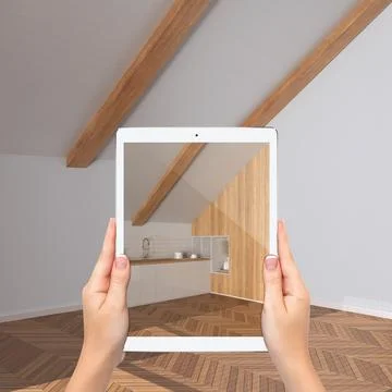 Augmented reality concept. Hand holding tablet with AR application used to .. Stock Photos
