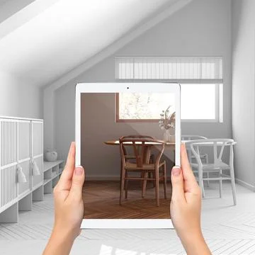 Augmented reality concept. Hand holding tablet with AR application used to .. Stock Photos