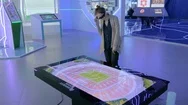Augmented Reality Experience With Hologram Maquette Of Stadium Stock Footage