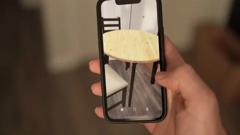 Augmented Reality Interior Design App Showing Virtual Furniture on Smartphone Stock Footage 168537625