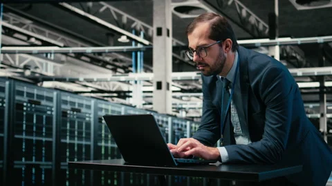 Augmented reality simulation, laptop and engineer in data center Stock Footage 329452098