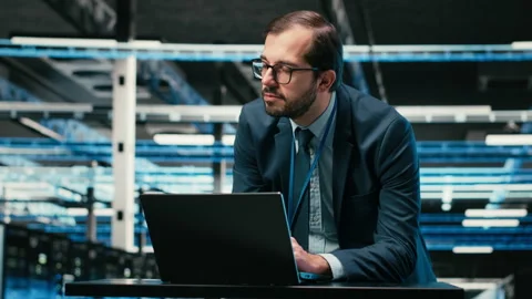 Augmented reality simulation, laptop and engineer in data center Stock Footage 329650349