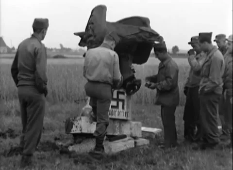 AUGSBURG - 1945: Blast setup - Troops prepare eagle monument Stock Footage 344495788