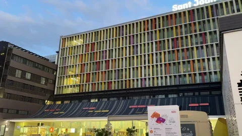 August 10, 2025 - Barcelona, Spain - Hospital Sant Joan de Deu building exterior Vídeos de archivo 338032550