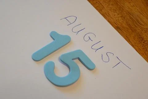 August 15 date written on paper Foto stock