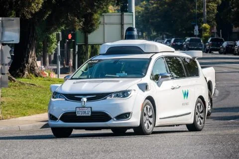 August 19, 2018 Mountain View / CA / USA - Waymo self driving car performing  Stock Photos