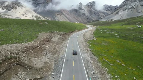 On august 20 2025:Driving a car on the highways of the Tibetan Plateau Stock Footage 319372004