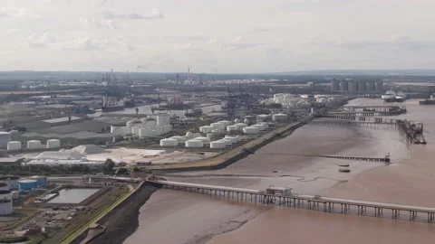 August 2021, UK: Immingham Docks - Aerial Drone Ships, Chimneys and Jetty Stock Footage 219482245