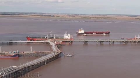 August 2021, UK: Immingham Docks - Aerial Drone Cargo Ship Leaving Port Stock Footage 219482533