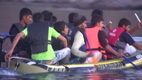 August 26, 2015 Bodrum Turkey. Syrian refugees fleeing from war trying to go out Stock Footage 143722004