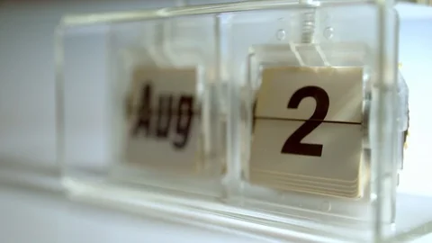 August . Old mechnical tabletop calendar at 4k. Parto of full year loop. Check m Stock Footage 91106788