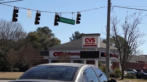 Augusta Georgia traffic at an intersection Peach Orchard Road and CVS pharmac Stock Footage 149052256