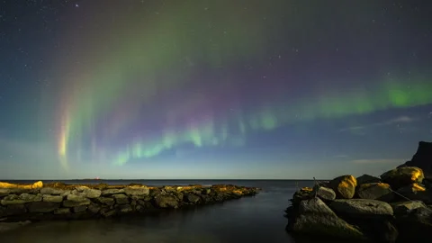 Aurora bands over the lagoon Stock Footage 250442344