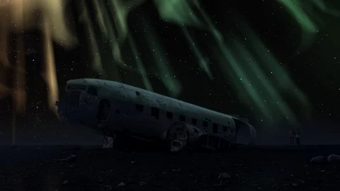 Aurora borealis crashed DC-3 Plane Solheimasandur winter sky tourism night Stock Footage 88171449