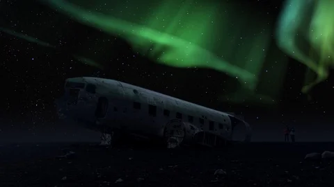 Aurora borealis crashed DC-3 Plane Solheimasandur winter sky tourism night Stock Footage 88171471